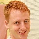 Redhead college boy Phillip strokes his small cock.