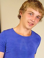 Cute twink Jonathan poses near his bike